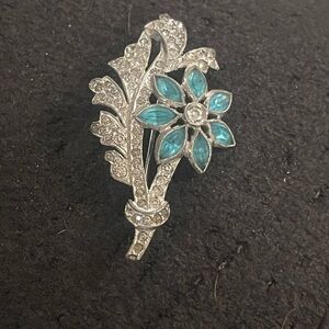 Elegant Silver and Blue Floral Brooch